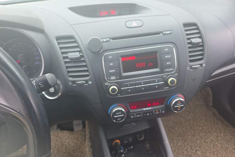 Used Kia K3 2013 1.6L Automatic DLX Audio And AC Panel