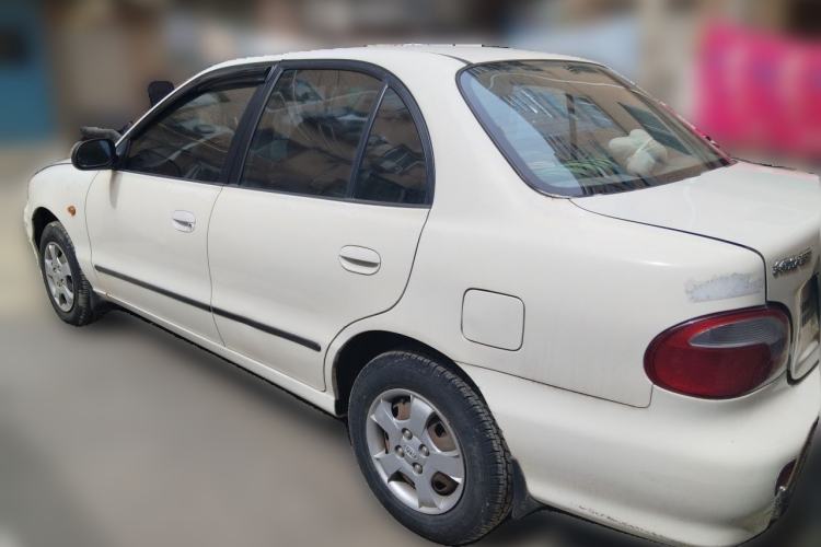Used Kia Pride 2004 1.3L MT Rear Left 45 Deg