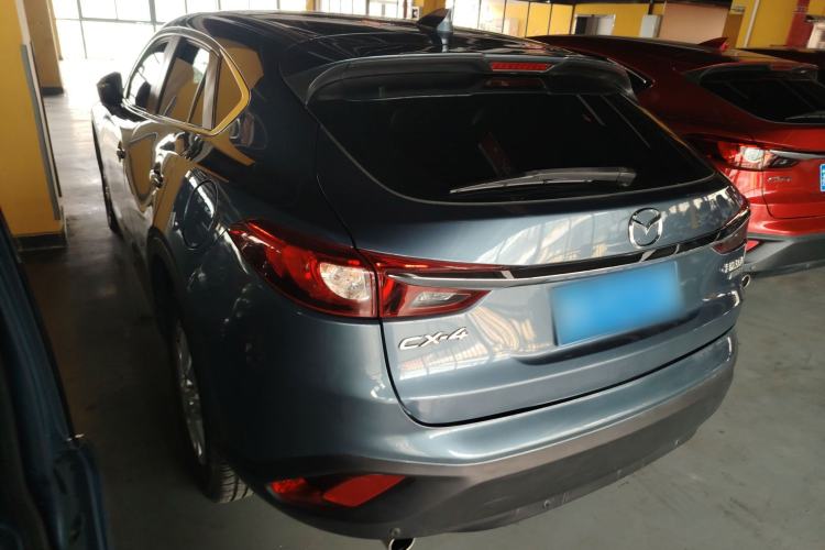 Used Mazda CX-4 2018 2.0L Automatic Two-Wheel Drive Blue Sky Luxury Edition Rear Left 45 Deg