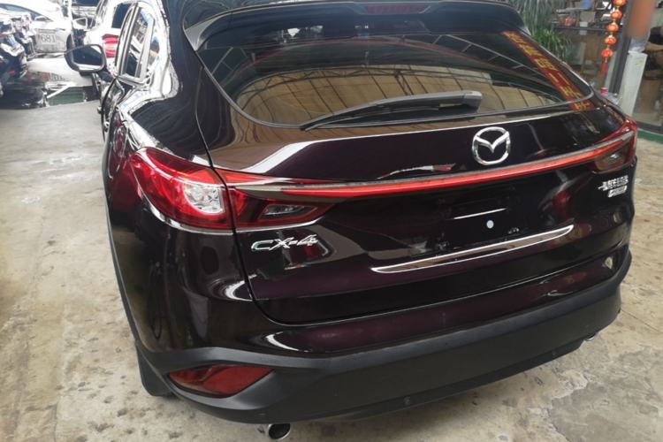 Used Mazda CX-4 2018 2.0L Automatic Two-Wheel Drive Blue Sky Luxury Edition Rear Left 45 Deg