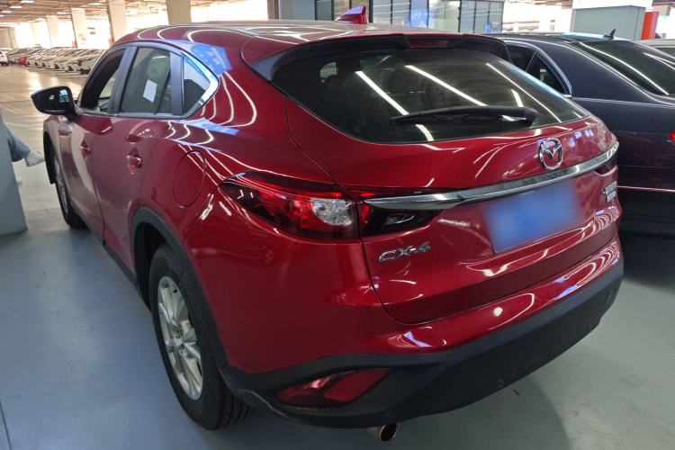 Used Mazda CX-4 2018 2.0L Automatic Two-Wheel Drive Blue Sky Luxury Edition Rear Left 45 Deg