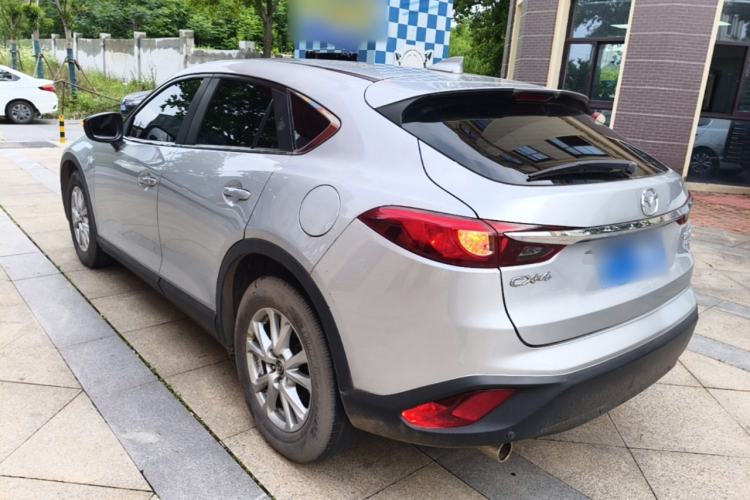 Used Mazda CX-4 2018 2.0L Automatic Two-Wheel Drive Blue Sky Luxury Edition Rear Left 45 Deg