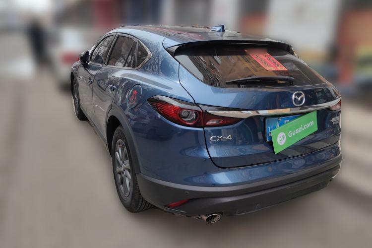 Used Mazda CX-4 2020 2.0L Automatic Two-Wheel Drive Blue Sky Exploration Edition Rear Left 45 Deg