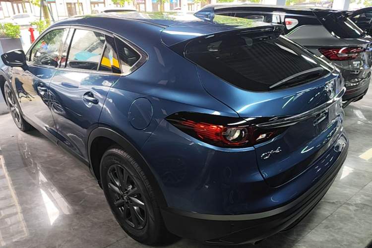 Used Mazda CX-4 2020 2.0L Automatic Two-Wheel Drive Blue Sky Youth Edition Rear Left 45 Deg