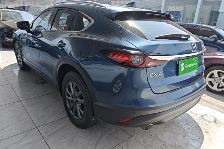 Used Mazda CX-4 2020 2.0L Automatic Two-Wheel Drive Blue Sky Luxury Edition Rear Left 45 Deg
