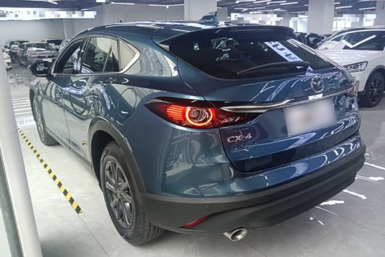 Used Mazda CX-4 2020 2.0L Automatic Two-Wheel Drive Blue Sky Exploration Edition Rear Left 45 Deg