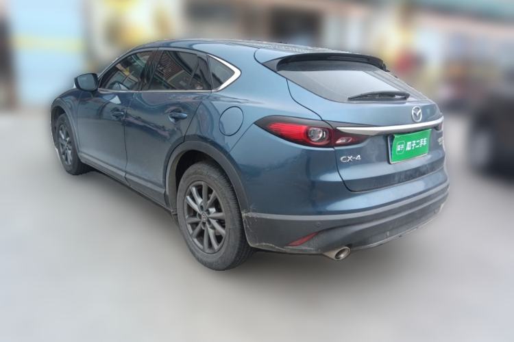 Used Mazda CX-4 2020 2.0L Automatic Two-Wheel Drive Blue Sky Dynamic Edition Rear Left 45 Deg