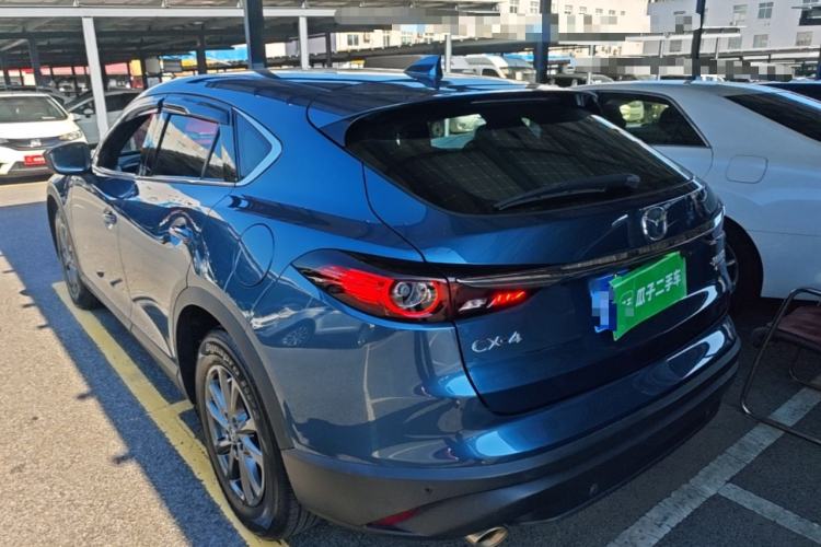 Used Mazda CX-4 2020 2.0L Automatic Two-Wheel Drive Blue Sky Dynamic Edition Rear Left 45 Deg