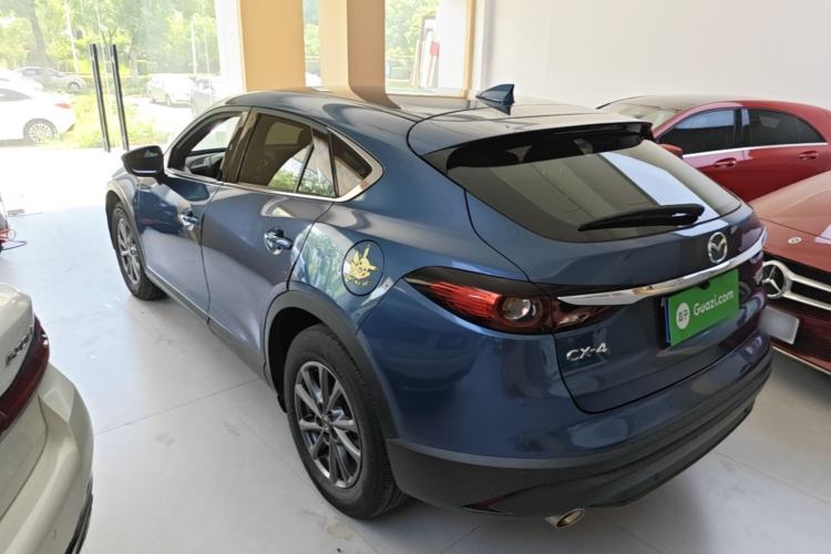 Used Mazda CX-4 2020 2.0L Automatic Two-Wheel Drive Blue Sky Exploration Edition Rear Left 45 Deg