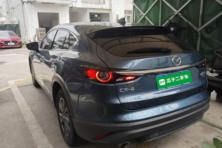 Used Mazda CX-4 2020 2.0L Automatic Two-Wheel Drive Blue Sky Exploration Edition Rear Left 45 Deg
