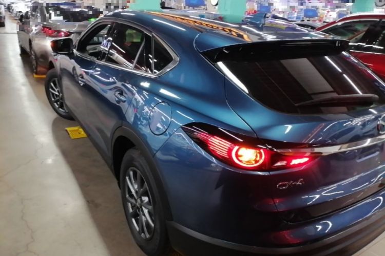 Used Mazda CX-4 2020 2.0L Automatic Two-Wheel Drive Blue Sky Dynamic Edition Rear Left 45 Deg