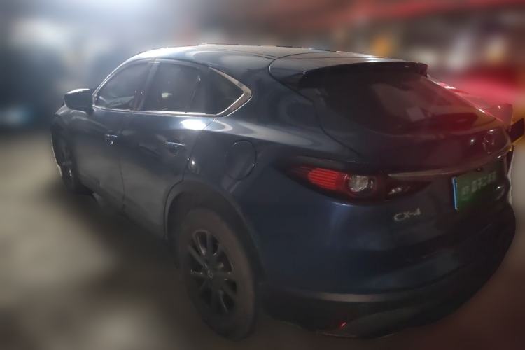 Used Mazda CX-4 2020 2.0L Automatic Two-Wheel Drive Blue Sky Dynamic Edition Rear Left 45 Deg