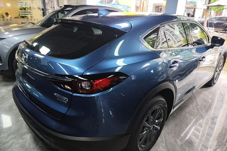 Used Mazda CX-4 2020 2.0L Automatic Two-Wheel Drive Blue Sky Youth Edition Rear Right 45 Deg