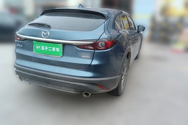 Used Mazda CX-4 2020 2.0L Automatic Two-Wheel Drive Blue Sky Dynamic Edition Rear Right 45 Deg