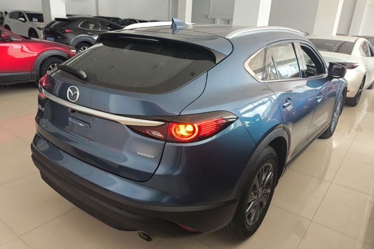 Used Mazda CX-4 2020 2.0L Automatic Two-Wheel Drive Blue Sky Dynamic Edition Rear Right 45 Deg