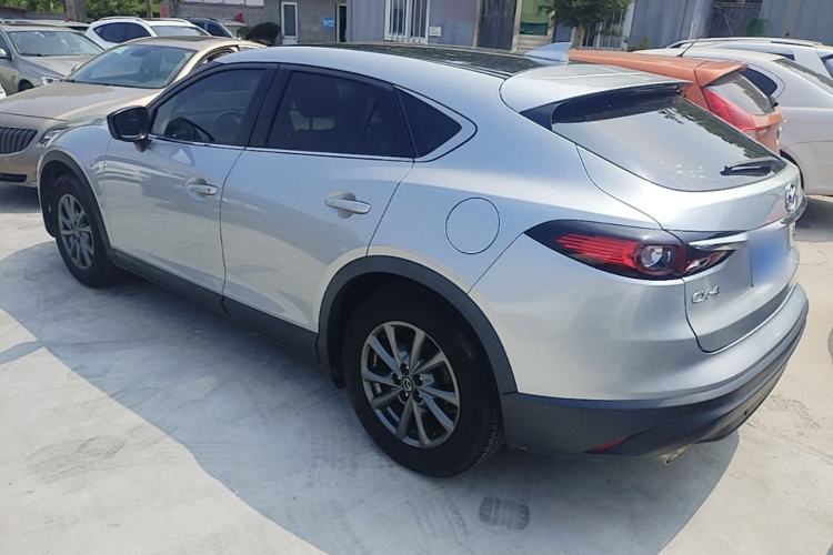 Used Mazda CX-4 2020 2.0L Automatic Two-Wheel Drive Blue Sky Dynamic Edition Rear Left 45 Deg