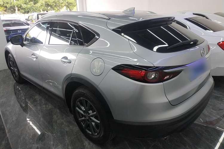 Used Mazda CX-4 2020 2.0L Automatic Two-Wheel Drive Blue Sky Exploration Edition Rear Left 45 Deg
