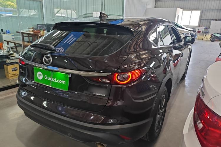 Used Mazda CX-4 2020 2.0L Automatic Two-Wheel Drive Blue Sky Dynamic Edition Rear Right 45 Deg