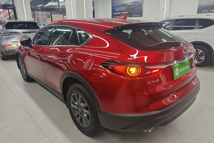 Used Mazda CX-4 2020 2.0L Automatic Two-Wheel Drive Blue Sky Exploration Edition Rear Left 45 Deg