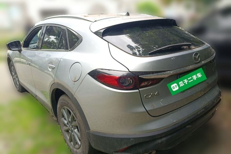 Used Mazda CX-4 2020 2.0L Automatic Two-Wheel Drive Blue Sky Luxury Edition Rear Left 45 Deg