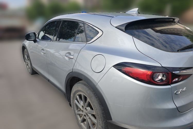 Used Mazda CX-4 2020 2.0L Automatic Two-Wheel Drive Blue Sky Dynamic Edition Rear Left 45 Deg