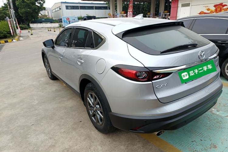 Used Mazda CX-4 2020 2.0L Automatic Two-Wheel Drive Blue Sky Dynamic Edition Rear Left 45 Deg
