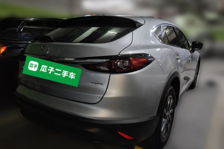 Used Mazda CX-4 2020 2.0L Automatic Two-Wheel Drive Blue Sky Dynamic Edition Rear Right 45 Deg
