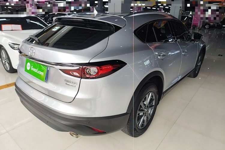 Used Mazda CX-4 2020 2.0L Automatic Two-Wheel Drive Blue Sky Luxury Edition Rear Right 45 Deg