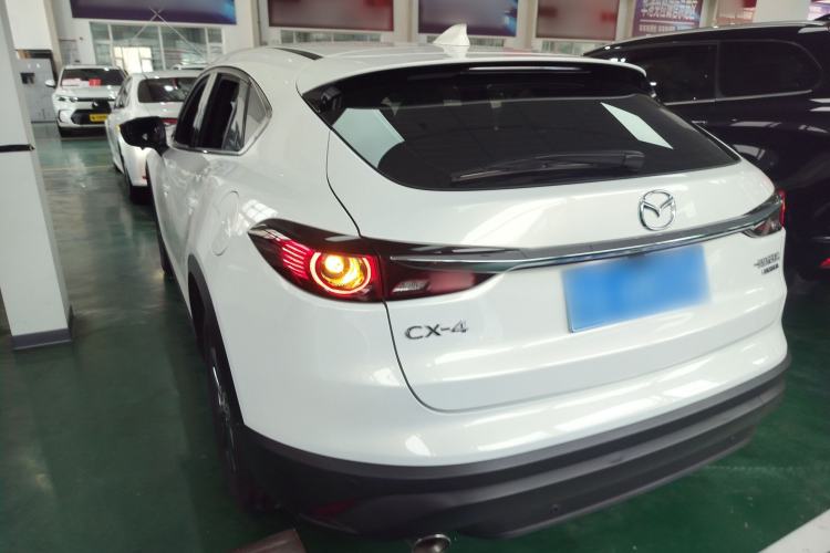 Used Mazda CX-4 2020 2.0L Automatic Two-Wheel Drive Blue Sky Dynamic Edition Rear Left 45 Deg