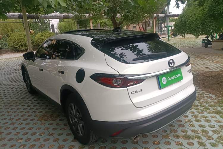 Used Mazda CX-4 2020 2.0L Automatic Two-Wheel Drive Blue Sky Dynamic Edition Rear Left 45 Deg