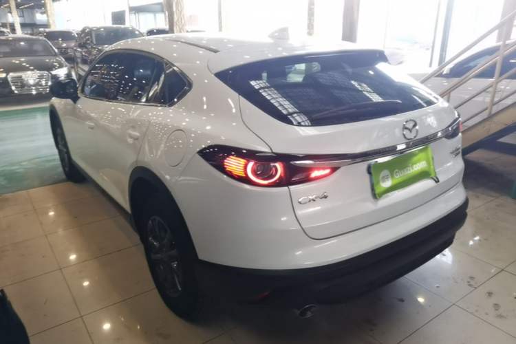 Used Mazda CX-4 2020 2.0L Automatic Two-Wheel Drive Blue Sky Exploration Edition Rear Left 45 Deg
