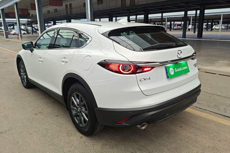 Used Mazda CX-4 2020 2.0L Automatic Two-Wheel Drive Blue Sky Exploration Edition Rear Left 45 Deg