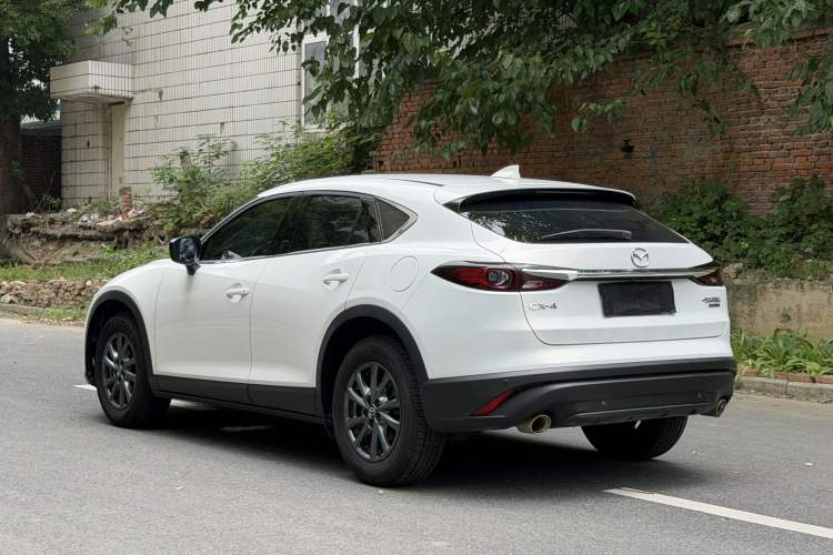 Used Mazda CX-4 2020 2.0L Automatic Two-Wheel Drive Blue Sky Exploration Edition Rear Left 45 Deg