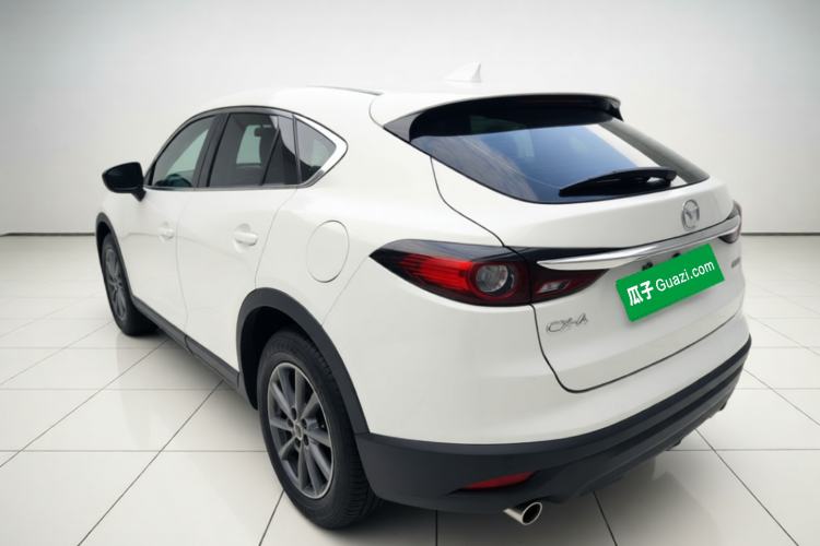 Used Mazda CX-4 2020 2.0L Automatic Two-Wheel Drive Blue Sky Dynamic Edition Rear Left 45 Deg