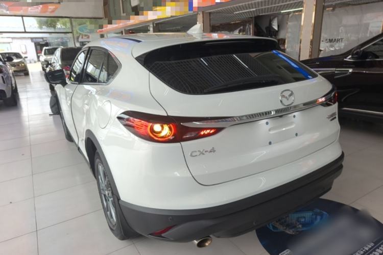 Used Mazda CX-4 2020 2.0L Automatic Two-Wheel Drive Blue Sky Dynamic Edition Rear Left 45 Deg