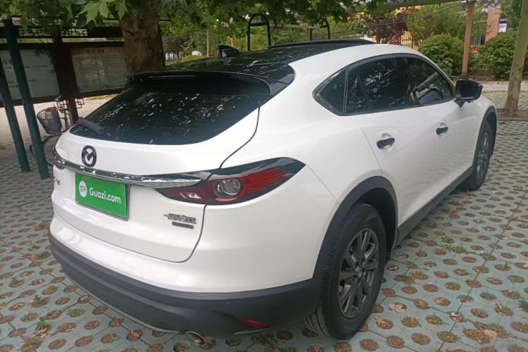Used Mazda CX-4 2020 2.0L Automatic Two-Wheel Drive Blue Sky Dynamic Edition Rear Right 45 Deg