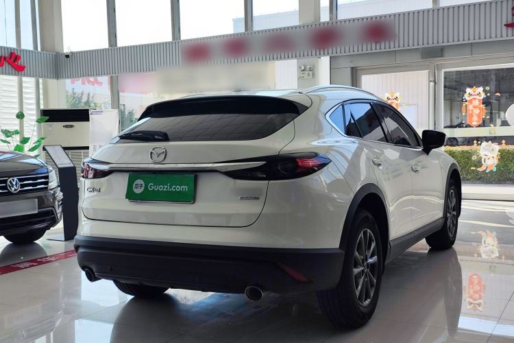 Used Mazda CX-4 2020 2.0L Automatic Two-Wheel Drive Blue Sky Luxury Edition Rear Right 45 Deg