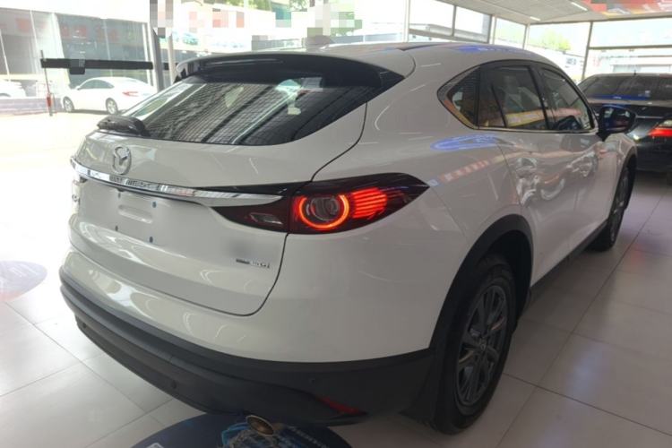 Used Mazda CX-4 2020 2.0L Automatic Two-Wheel Drive Blue Sky Dynamic Edition Rear Right 45 Deg