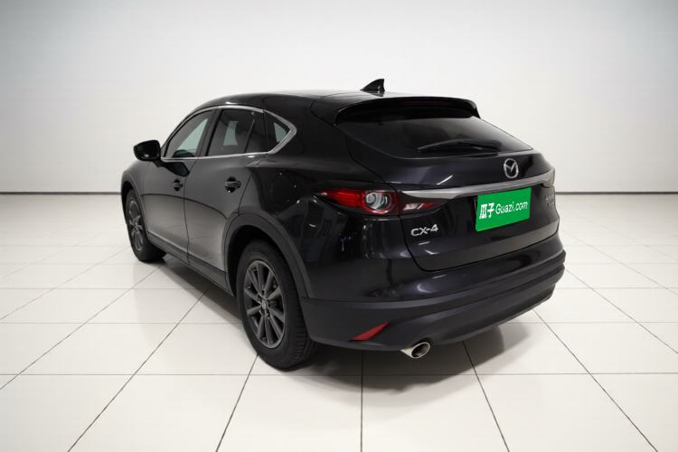 Used Mazda CX-4 2021 2.0L Automatic Two-Wheel Drive Blue Sky Exploration Edition Rear Left 45 Deg