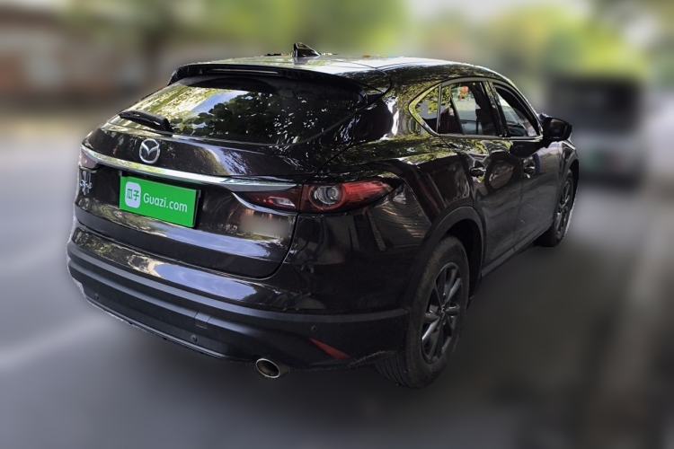 Used Mazda CX-4 2021 2.0L Automatic Two-Wheel Drive Blue Sky Exploration Edition Rear Right 45 Deg