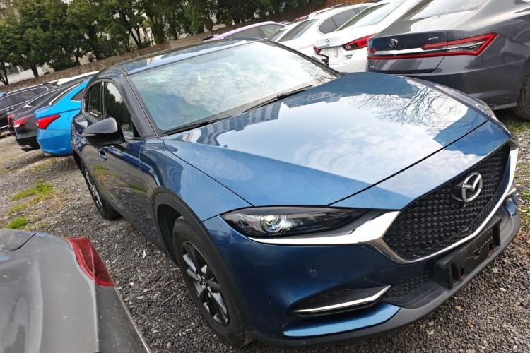 Used Mazda CX-4 2021 2.0L Automatic Two-Wheel Drive Blue Sky Exploration Edition Front Right 45 Deg