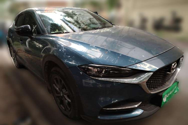 Used Mazda CX-4 2021 2.0L Automatic Two-Wheel Drive Blue Sky Dynamic Edition Front Right 45 Deg