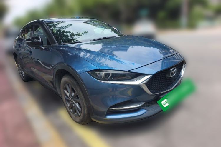 Used Mazda CX-4 2021 2.0L Automatic Two-Wheel Drive Blue Sky Dynamic Edition Front Right 45 Deg