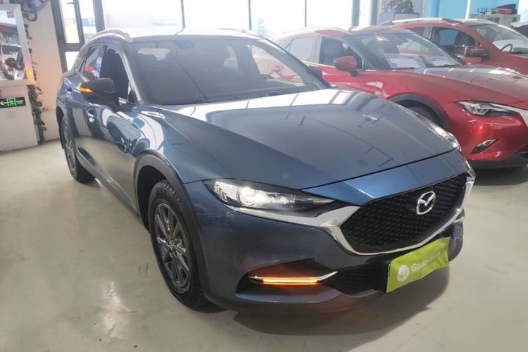 Used Mazda CX-4 2021 2.0L Automatic Two-Wheel Drive Blue Sky Dynamic Edition Front Right 45 Deg