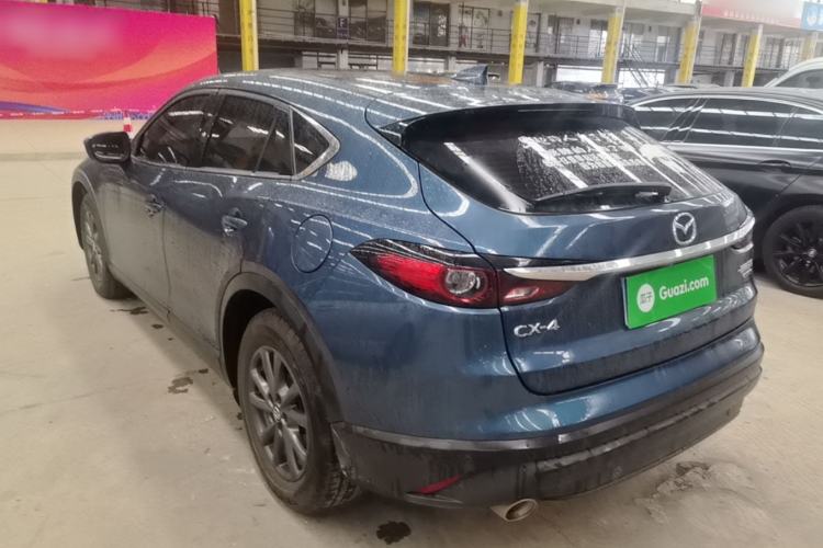 Used Mazda CX-4 2021 2.0L Automatic Two-Wheel Drive Blue Sky Exploration Edition Rear Left 45 Deg