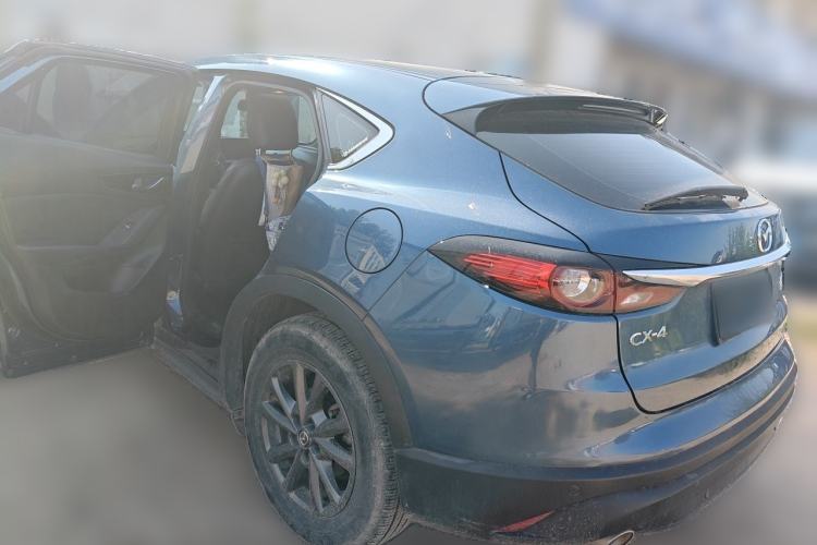 Used Mazda CX-4 2021 2.0L Automatic Two-Wheel Drive Blue Sky Exploration Edition Rear Left 45 Deg