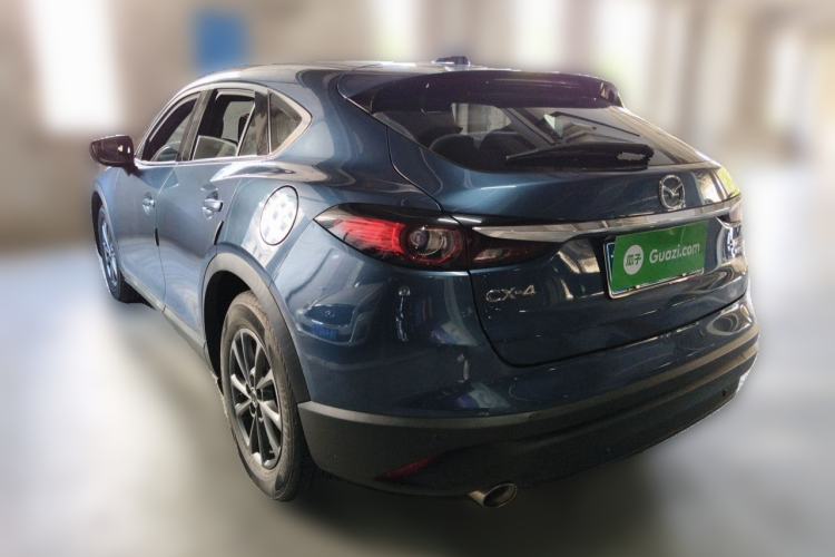 Used Mazda CX-4 2021 2.0L Automatic Two-Wheel Drive Blue Sky Dynamic Edition Rear Left 45 Deg