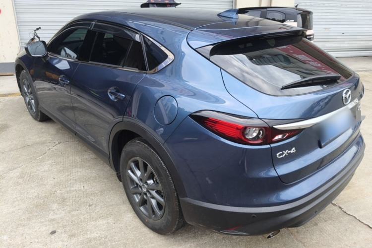 Used Mazda CX-4 2021 2.0L Automatic Two-Wheel Drive Blue Sky Exploration Edition Rear Left 45 Deg