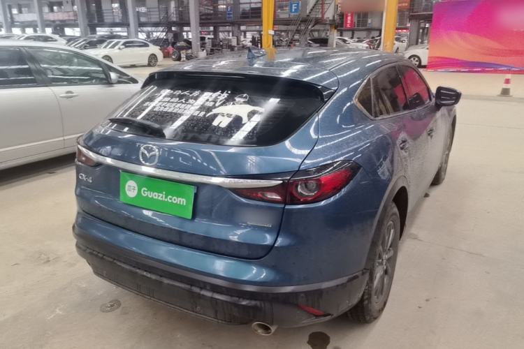 Used Mazda CX-4 2021 2.0L Automatic Two-Wheel Drive Blue Sky Exploration Edition Rear Right 45 Deg