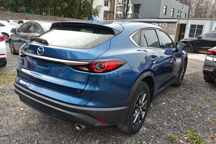 Used Mazda CX-4 2021 2.0L Automatic Two-Wheel Drive Blue Sky Exploration Edition Rear Right 45 Deg